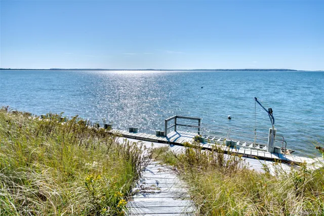 a view of a swimming pool and an outdoor space