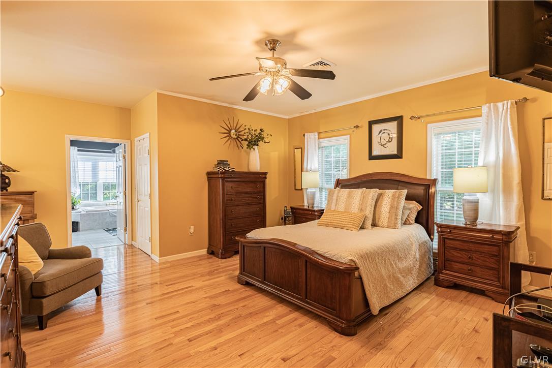 1539 Rachel Road Stroudsburg, PA 18360 - Photo 23 of 50 a bedroom with a bed and wooden floor