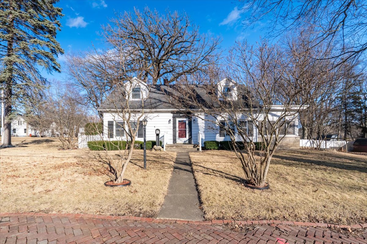 603 South Main Street Eureka, IL 61530 - Photo 1 of 32 a view of a house with a yard covered in snow