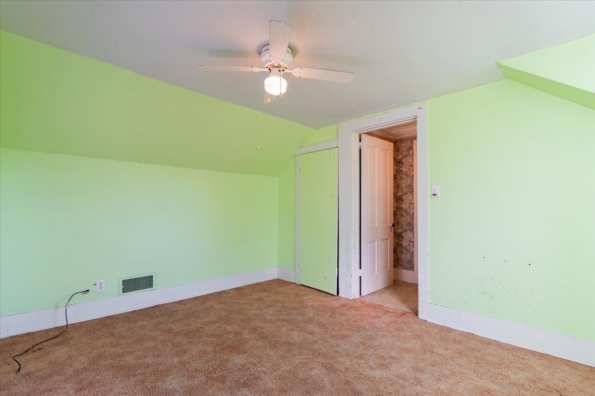 603 South Main Street Eureka, IL 61530 - Photo 20 of 32 an empty room with a fan and a fan