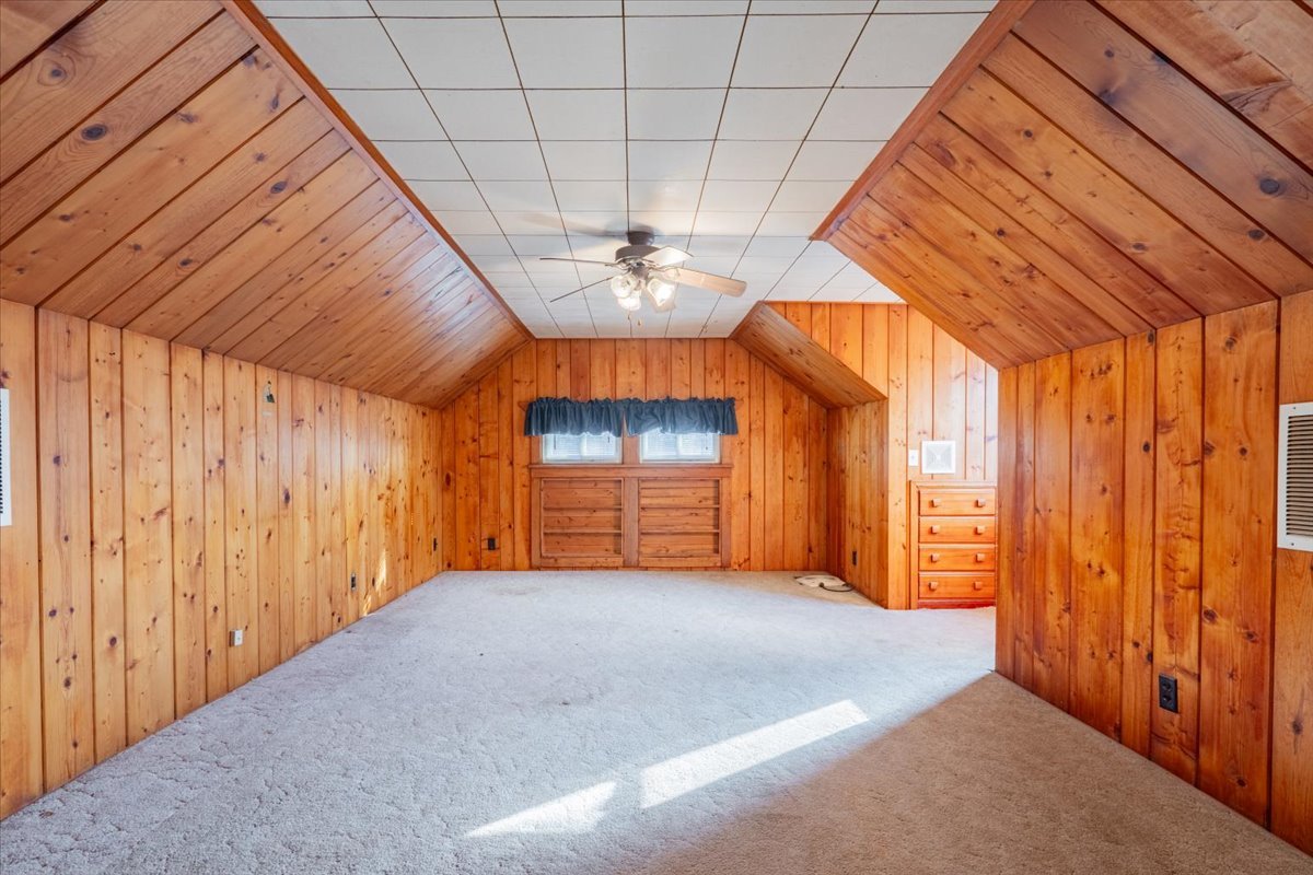 603 South Main Street Eureka, IL 61530 - Photo 21 of 32 a view of a livingroom with a ceiling fan and window