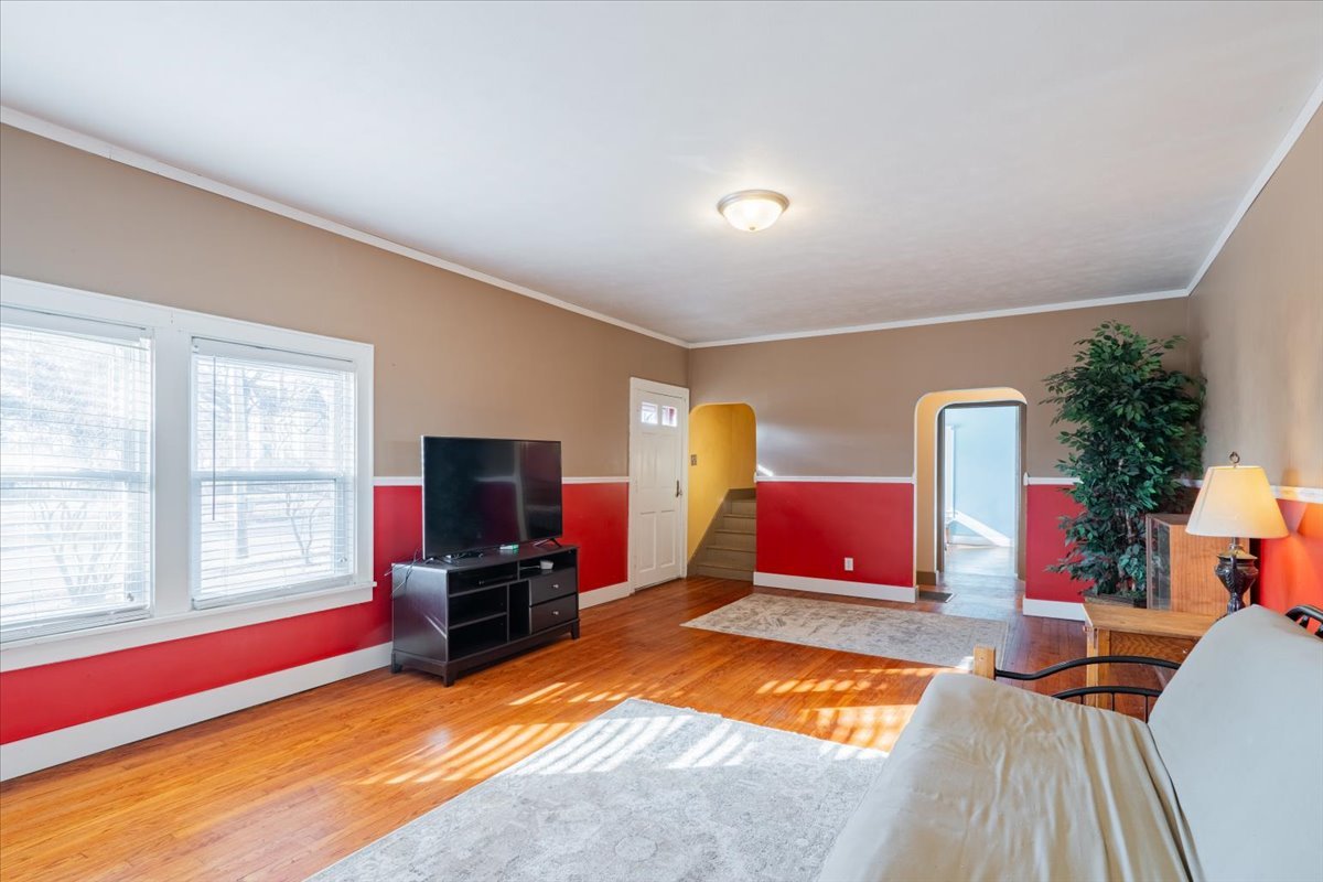 603 South Main Street Eureka, IL 61530 - Photo 7 of 32 a living room with furniture and a flat screen tv