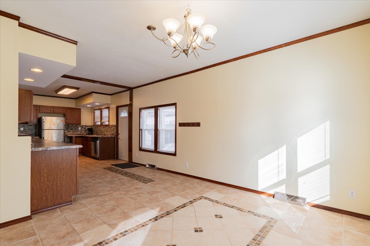 603 South Main Street Eureka, IL 61530 - Photo 9 of 32 a view of a livingroom with furniture cabinets and window