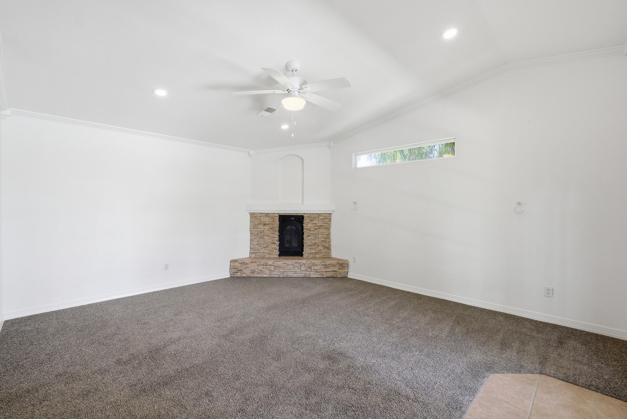 618 Birdsong Court Exeter, CA 93221 - Photo 43 of 62 an empty room with fan and windows
