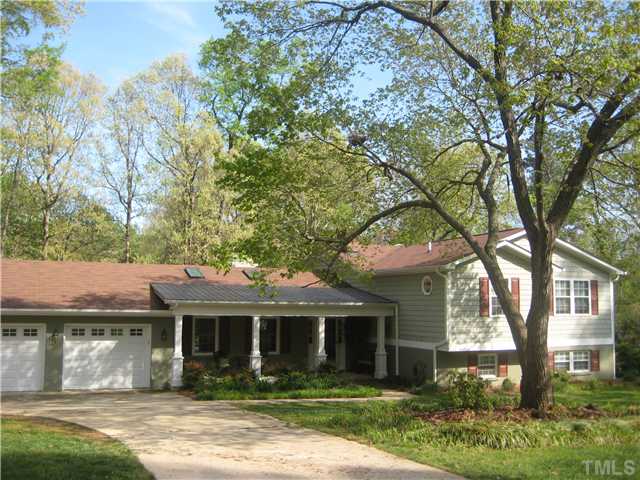 1700 Su John Road Raleigh, NC 27607 - Photo 2 of 18 front view of house with a yard
