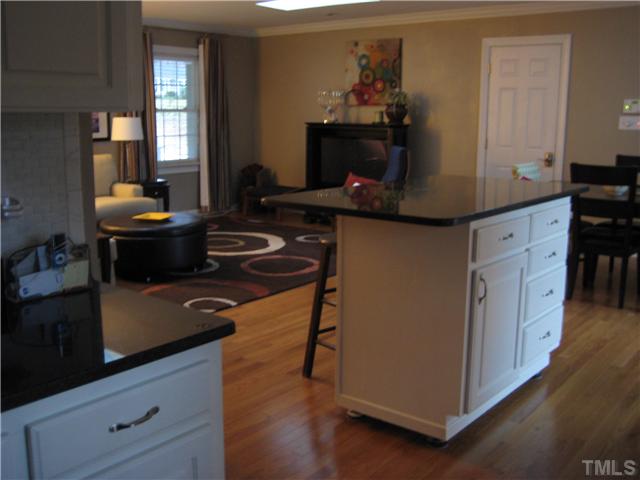 1700 Su John Road Raleigh, NC 27607 - Photo 5 of 18 a kitchen with a stove and a microwave