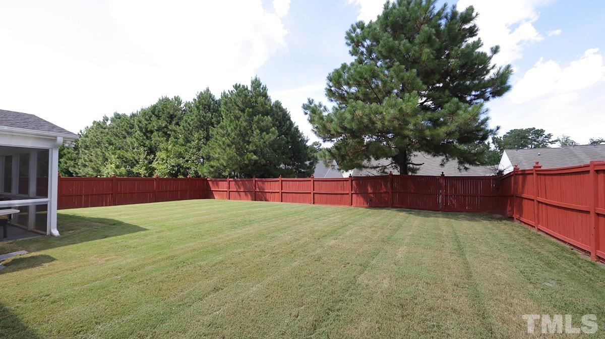 5410 Wind Mountain Lane Raleigh, NC 27613 - Photo 13 of 13 a view of a backyard