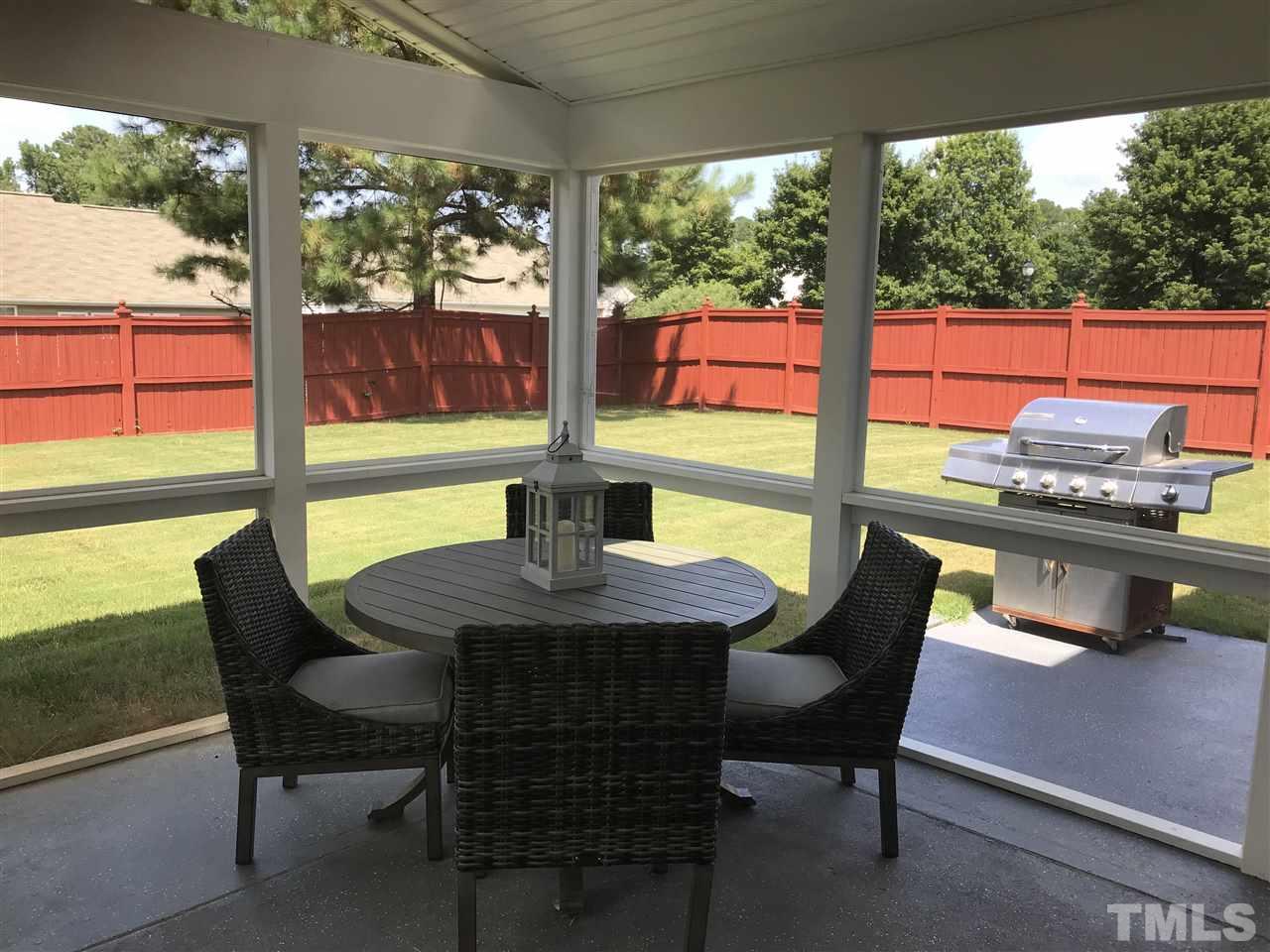 5410 Wind Mountain Lane Raleigh, NC 27613 - Photo 4 of 13 a view of a outdoor seating area with furniture