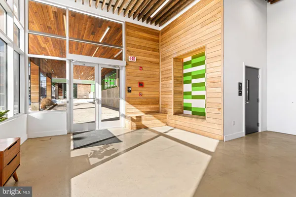 a view of a building with car parked