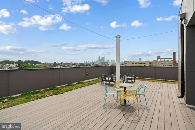 a wooden deck with lake view