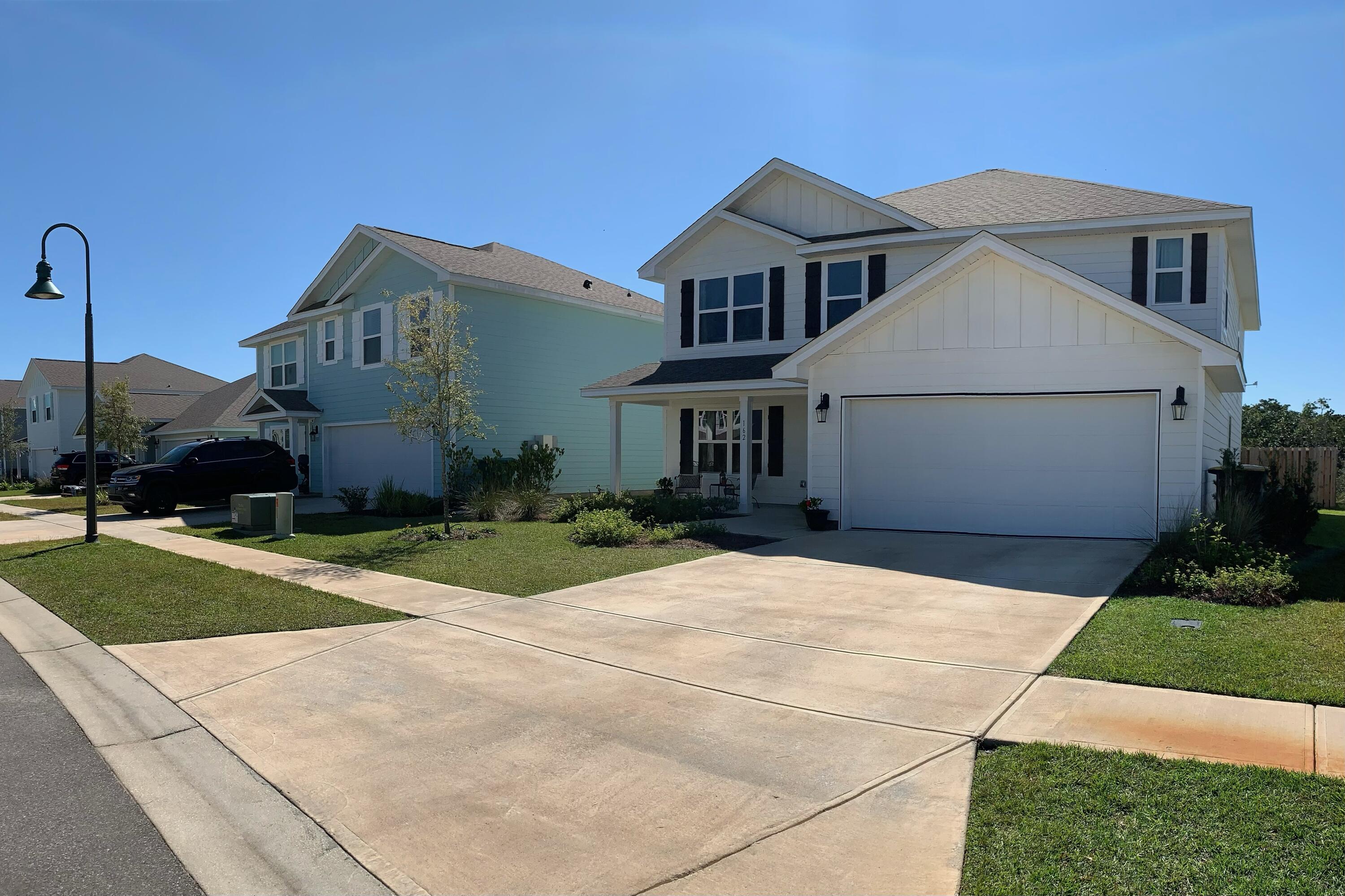 162 This Way Freeport, FL 32439 - Photo 2 of 55 a front view of a house with a yard