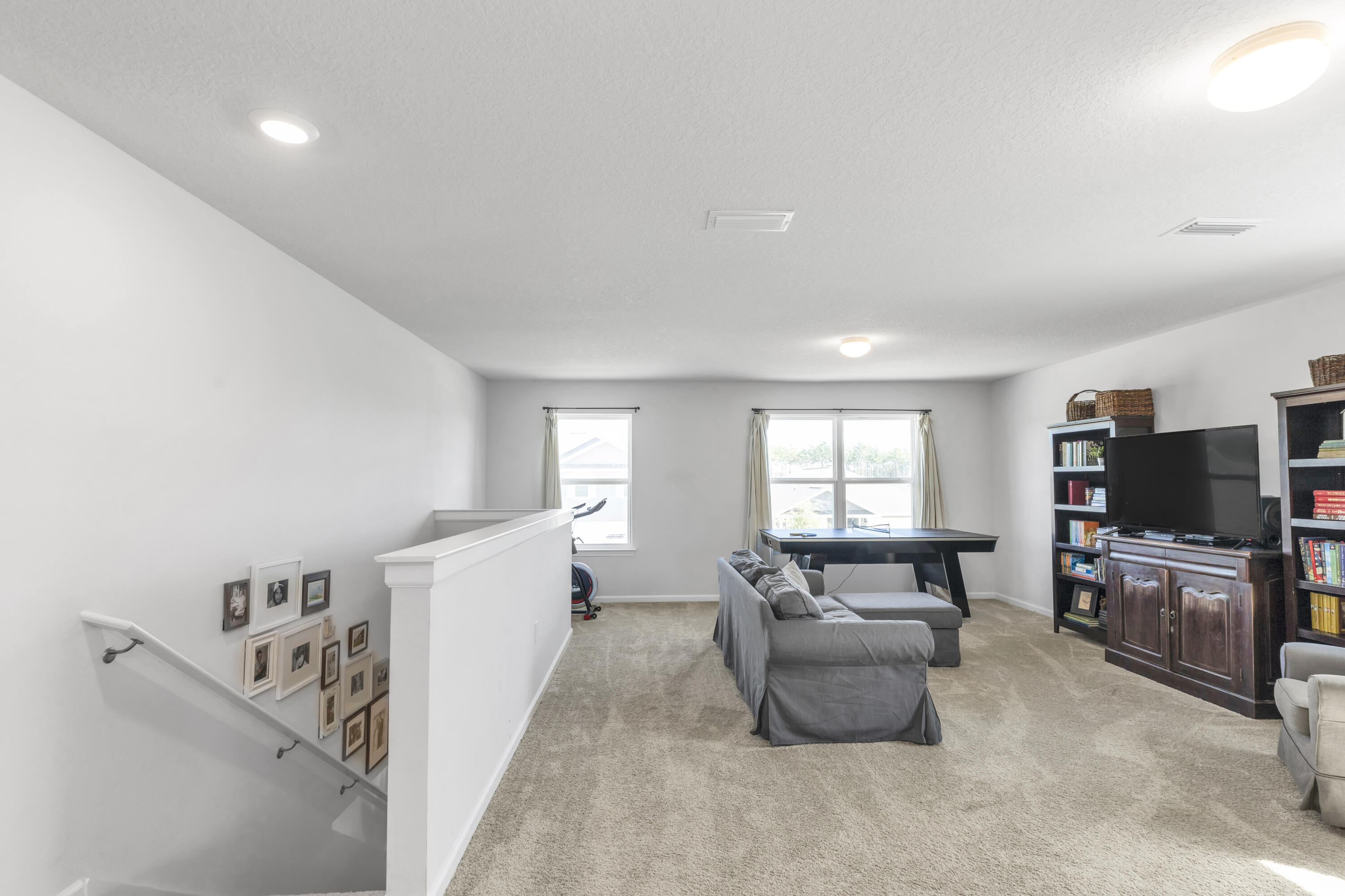 162 This Way Freeport, FL 32439 - Photo 34 of 55 a living room with furniture and a flat screen tv