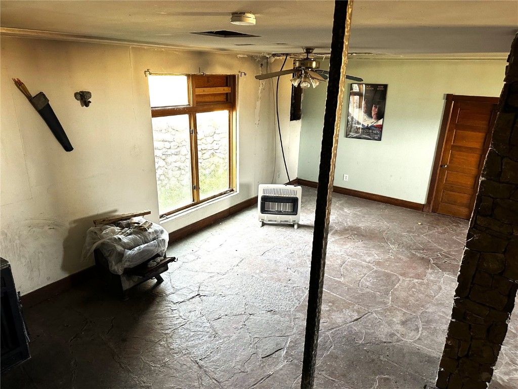 6558 Rio Blanco Road Hartsel, CO 80449 - Photo 18 of 40 a living room with furniture and a window