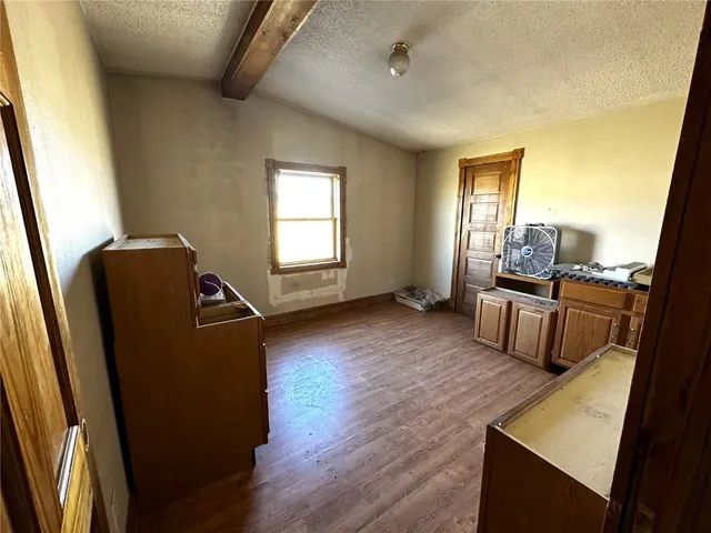 a room with furniture and gym equipment