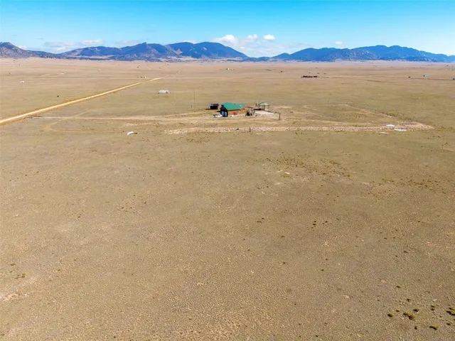 wooden floor with a view of lake