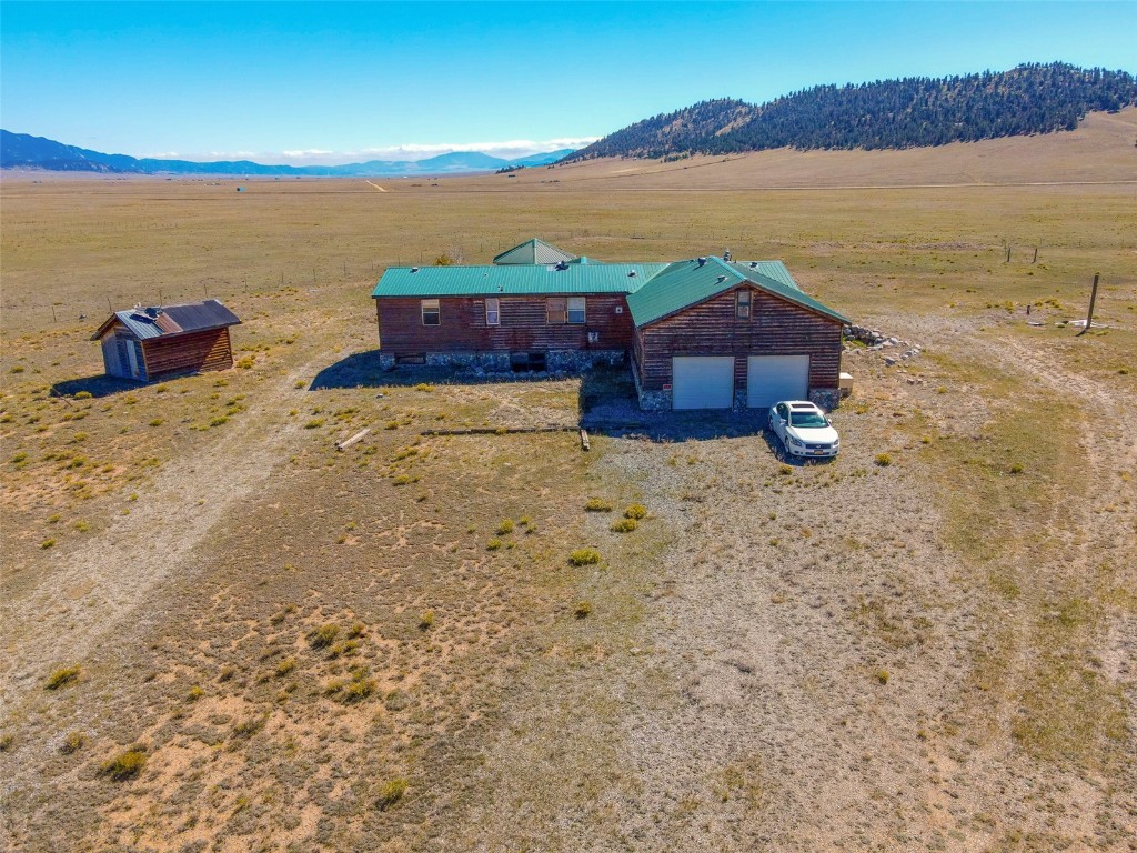 6558 Rio Blanco Road Hartsel, CO 80449 - Photo 6 of 40 a view of lake with mountain