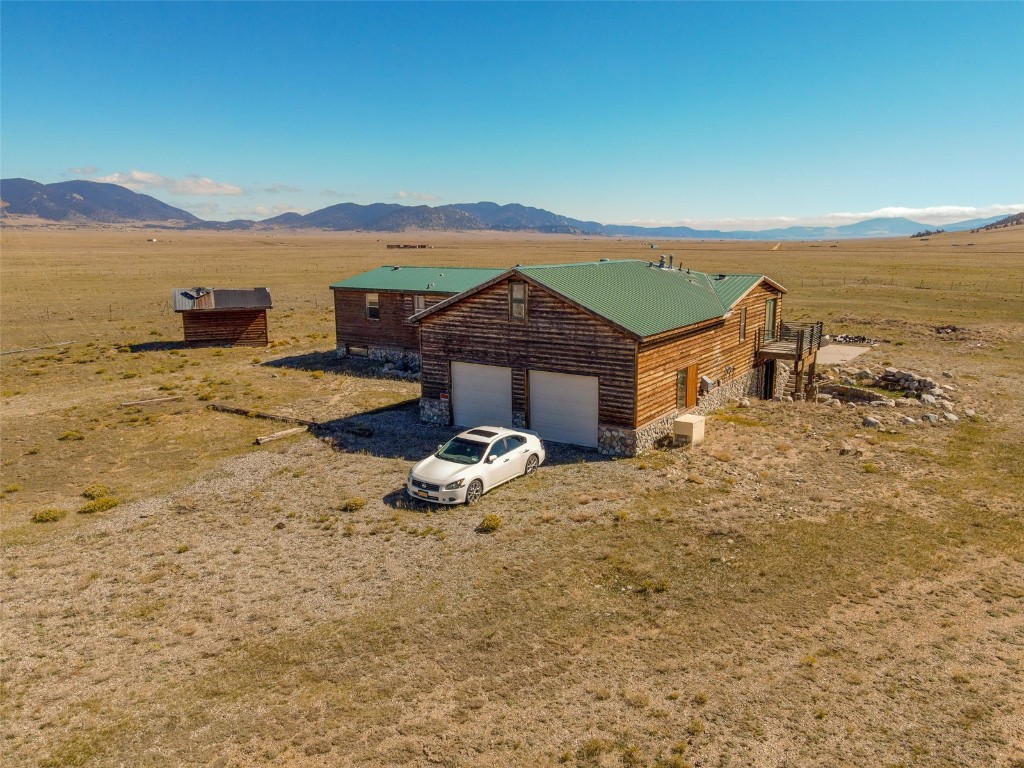6558 Rio Blanco Road Hartsel, CO 80449 - Photo 7 of 40 a view of a lake with mountain