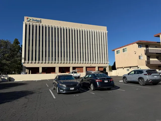a car parked in front of a house