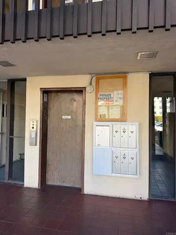 an entryway with wooden floor