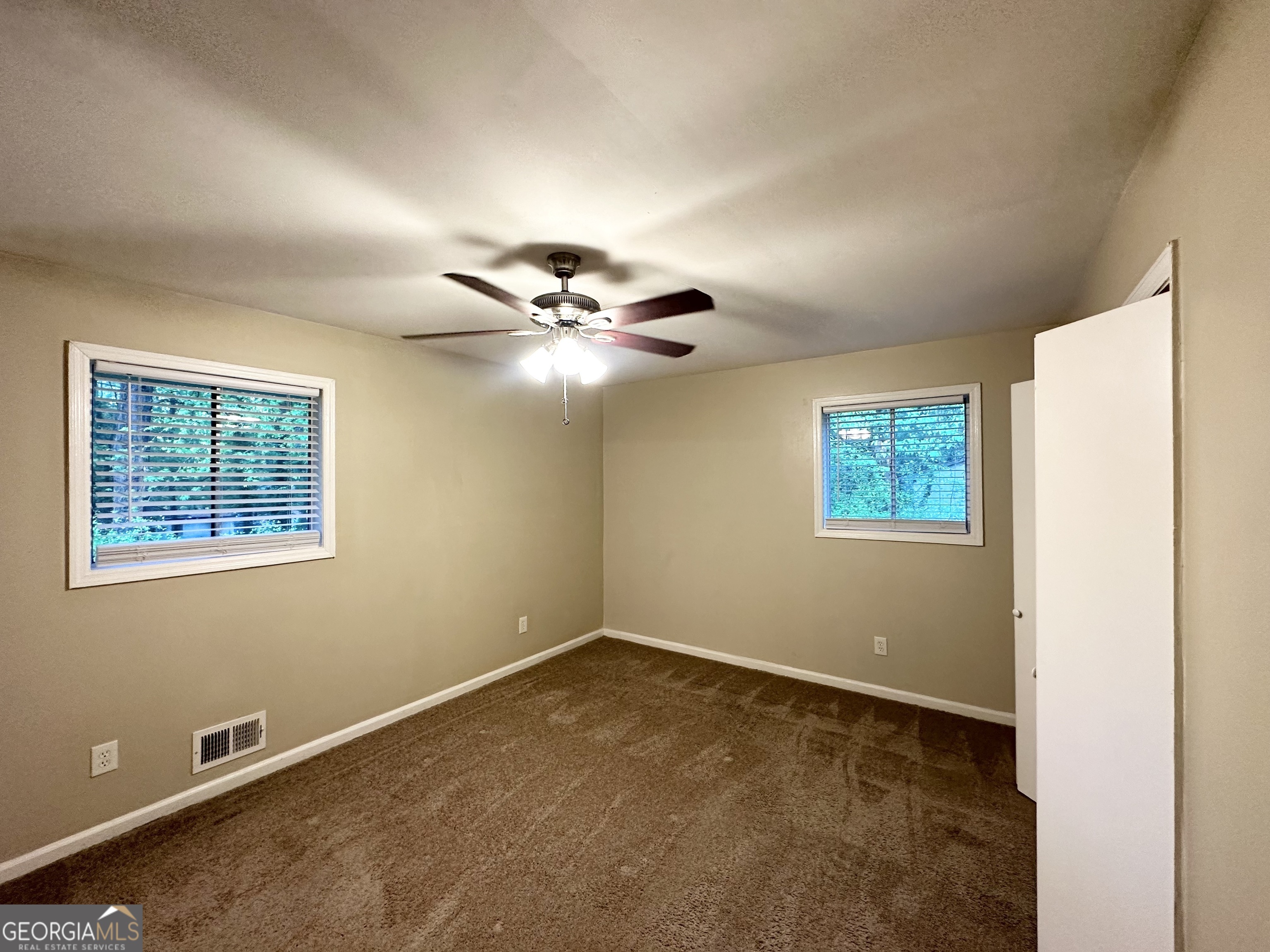 4505 Wonder Valley Trail Decatur, GA 30034 - Photo 15 of 24 a view of an empty room with a window