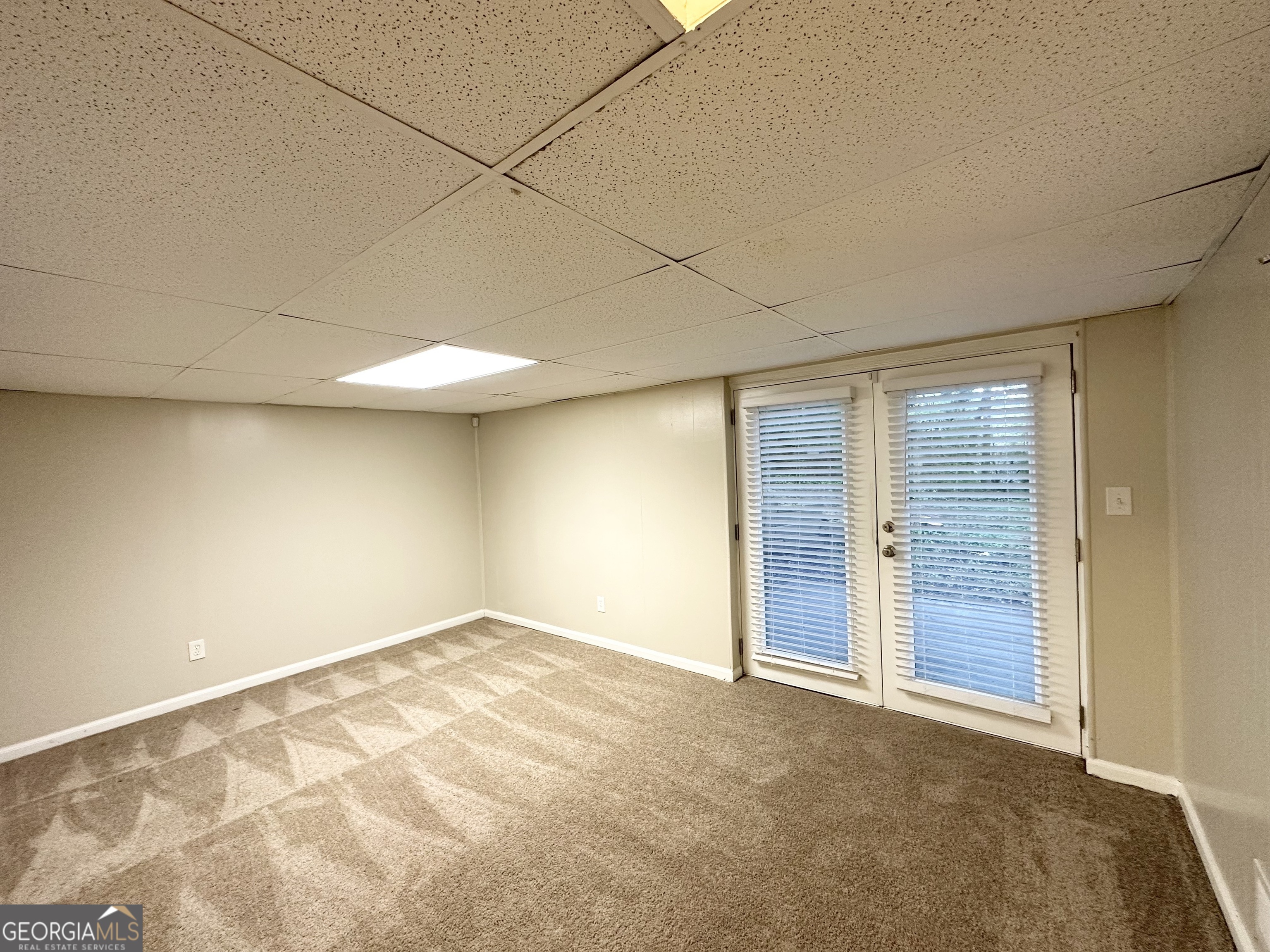 4505 Wonder Valley Trail Decatur, GA 30034 - Photo 19 of 24 an empty room with a natural light
