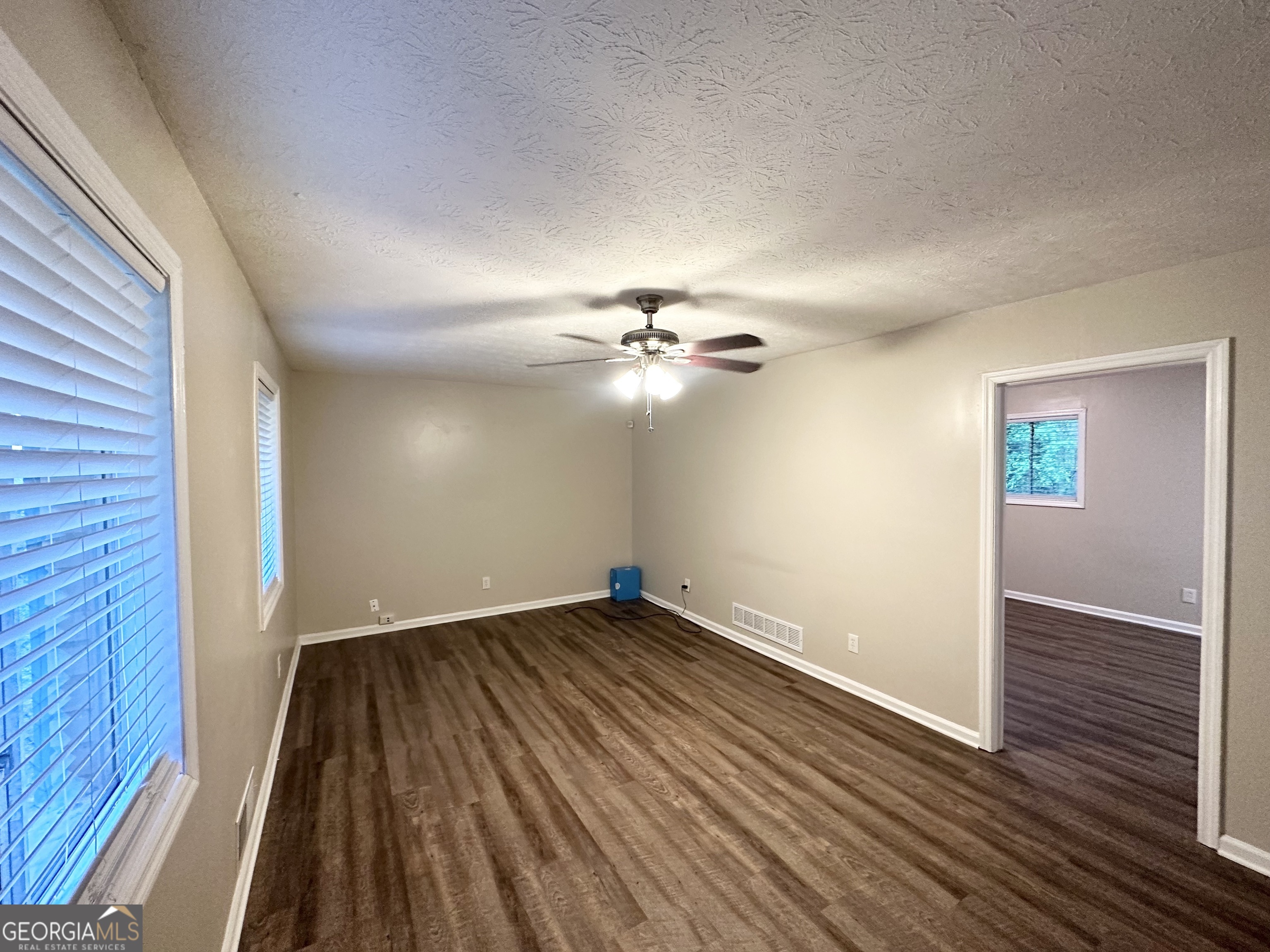 4505 Wonder Valley Trail Decatur, GA 30034 - Photo 3 of 24 wooden floor in an empty room with a window