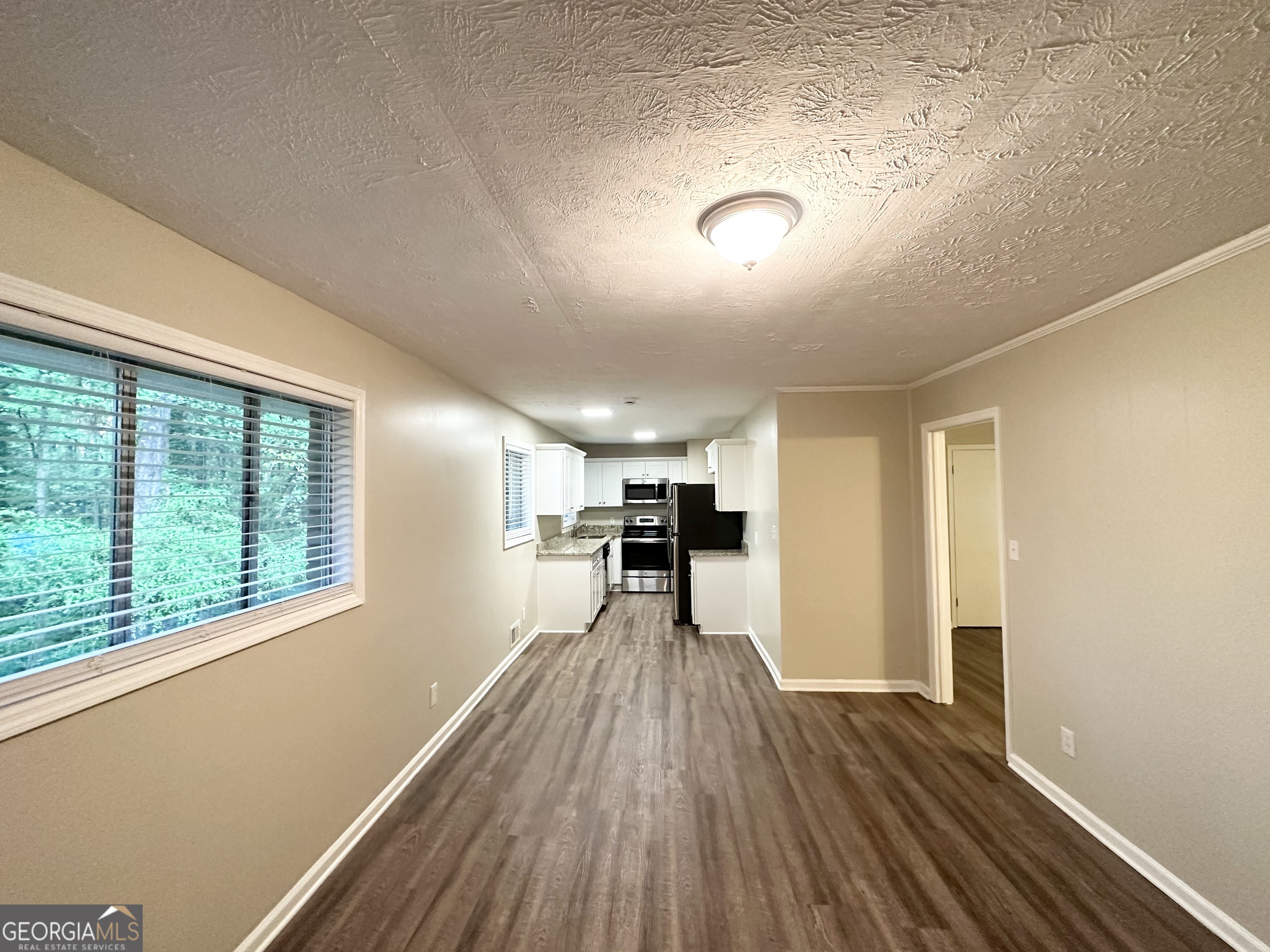 4505 Wonder Valley Trail Decatur, GA 30034 - Photo 6 of 24 a view of empty room with wooden floor