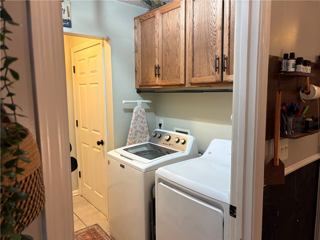 507 Branchcliff Lane Anderson, SC 29621 - Photo 34 of 47 This functional laundry area features efficient appliances and ample cabinet storage.