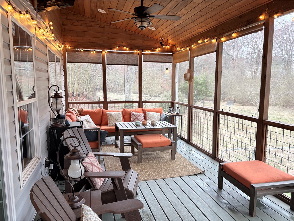 507 Branchcliff Lane Anderson, SC 29621 - Photo 40 of 47 Relax and unwind in this inviting screened-in porch, offering tranquil views of the surrounding natural landscape.