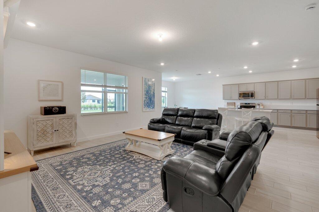 12328 Southwest Roma Circle Port St. Lucie, FL 34987 - Photo 23 of 72 Living Room to Patio.jpeg-SMALL
