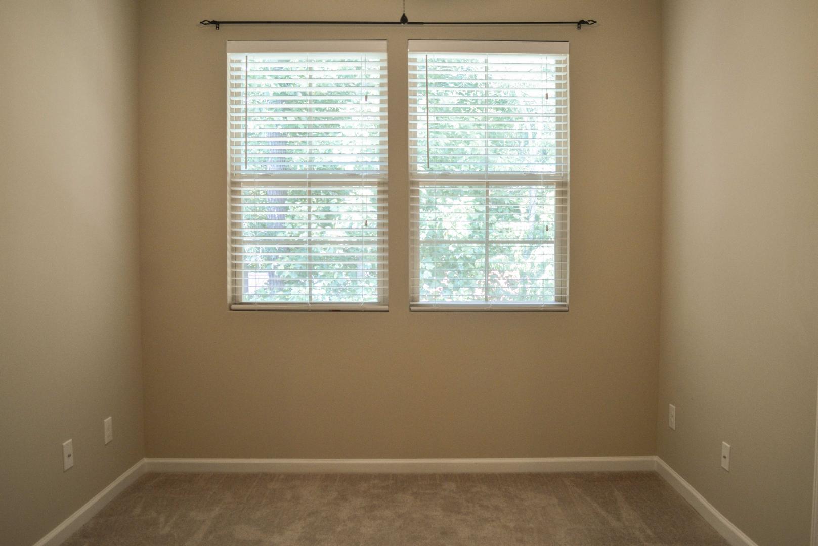 720 Wickham Ridge Road Apex, NC 27539 - Photo 16 of 24 a room that has a window in it