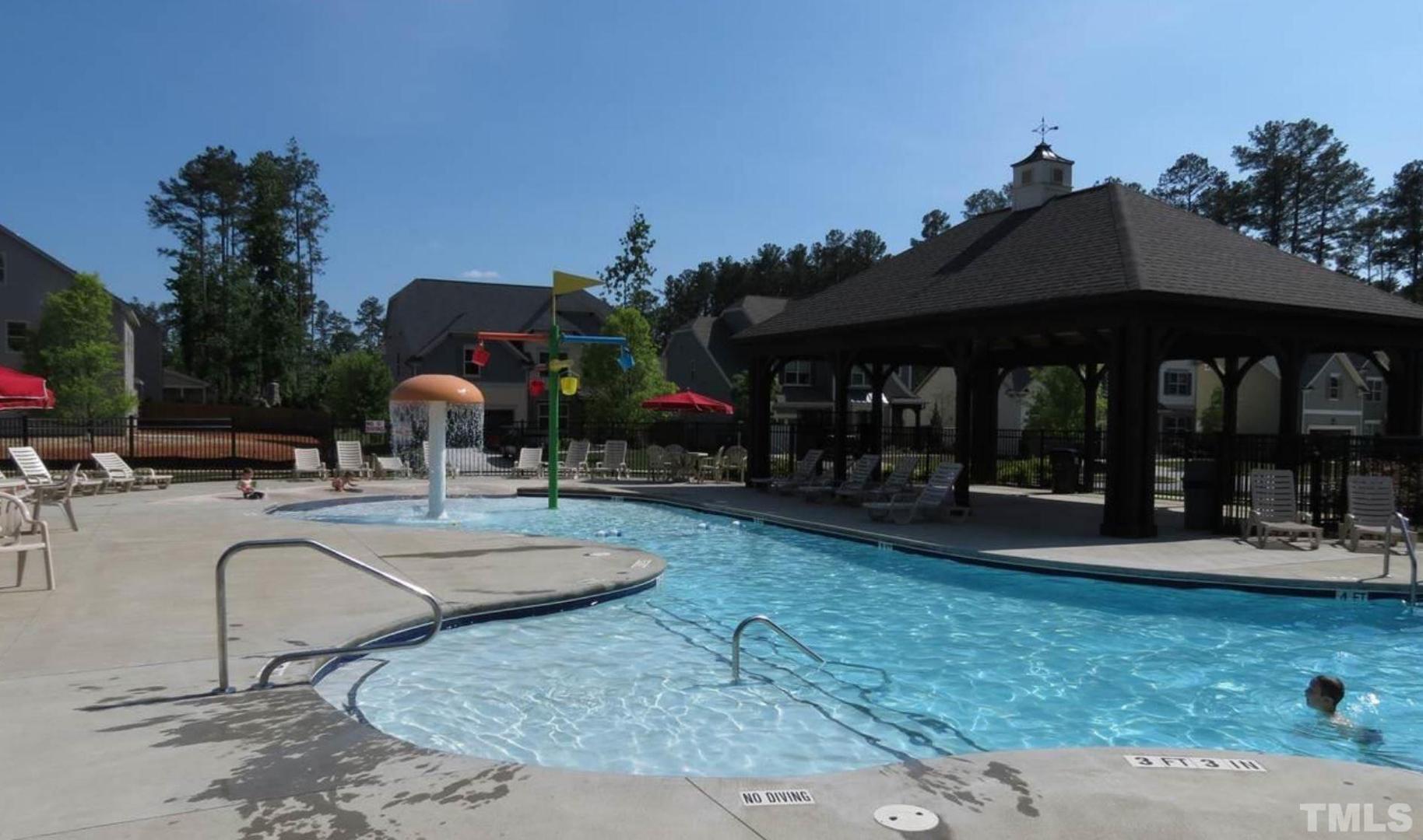 720 Wickham Ridge Road Apex, NC 27539 - Photo 21 of 24 a view of a house with entertaining space