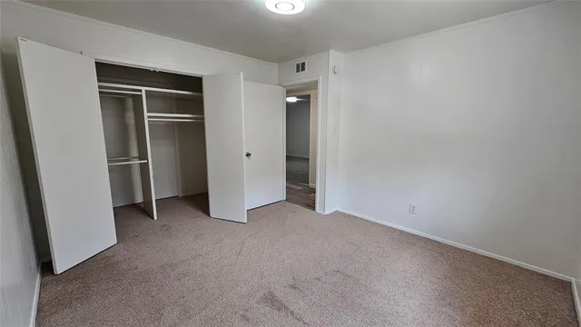a bathroom with a bath tub with a shower