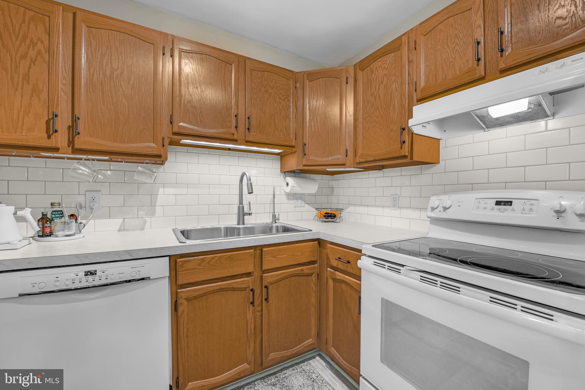 606 South Cedar Street Lititz, PA 17543 - Photo 13 of 39 a kitchen with a sink cabinets and appliances