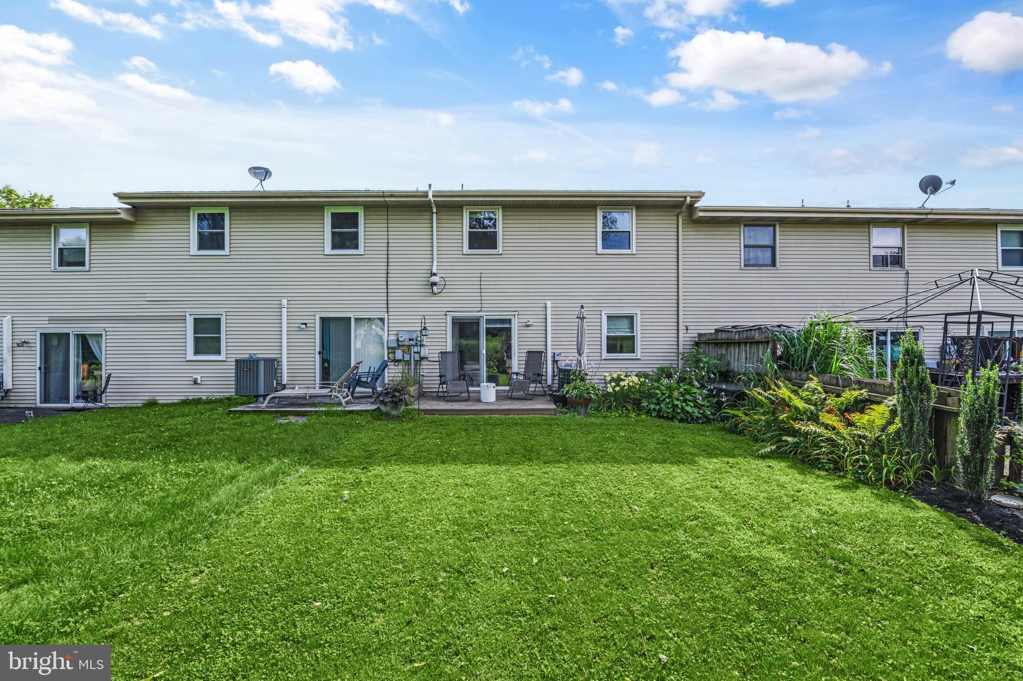 606 South Cedar Street Lititz, PA 17543 - Photo 31 of 39 a view of a house with backyard and sitting area