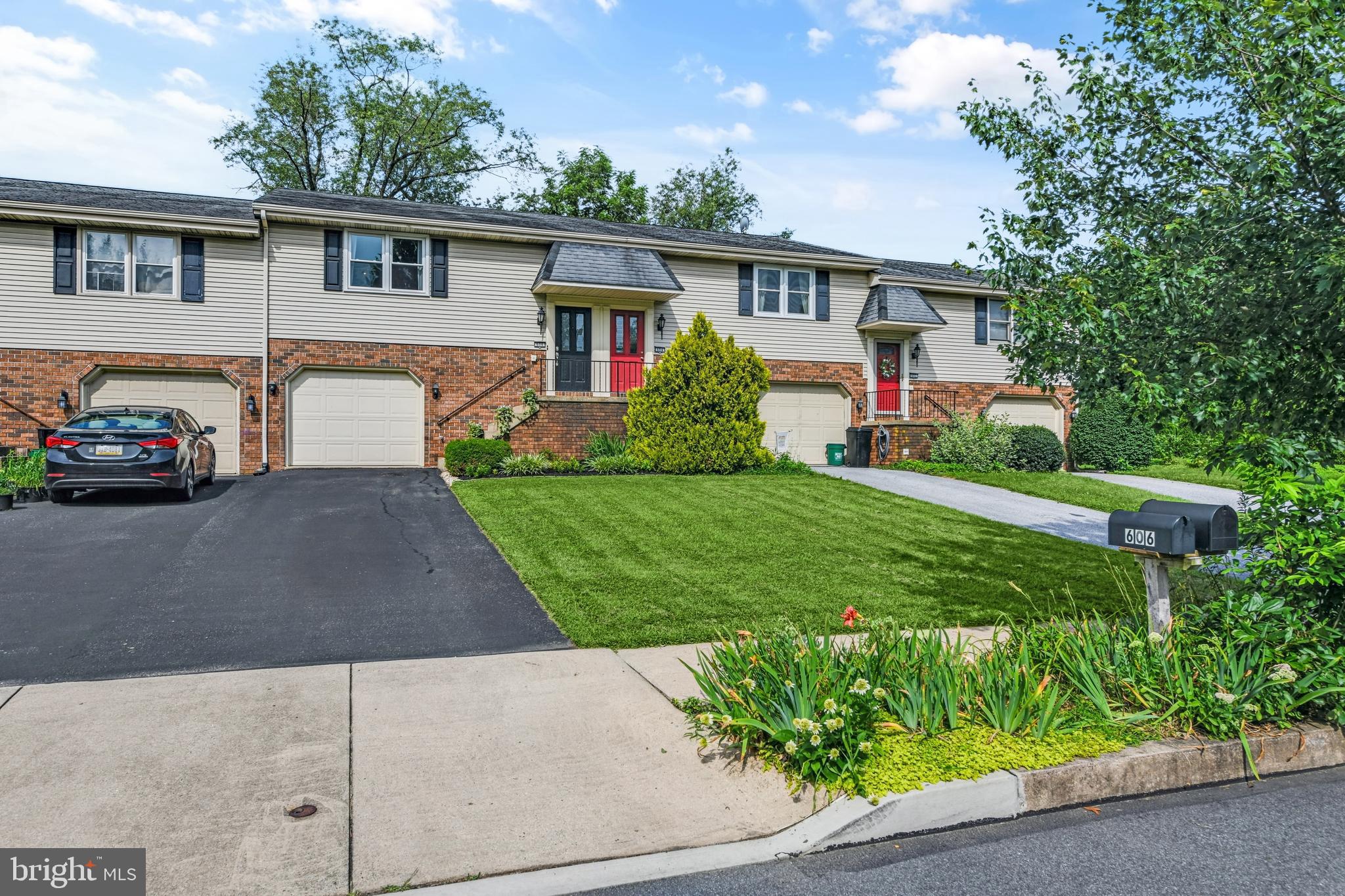 606 South Cedar Street Lititz, PA 17543 - Photo 38 of 39 a view of house that has a yard