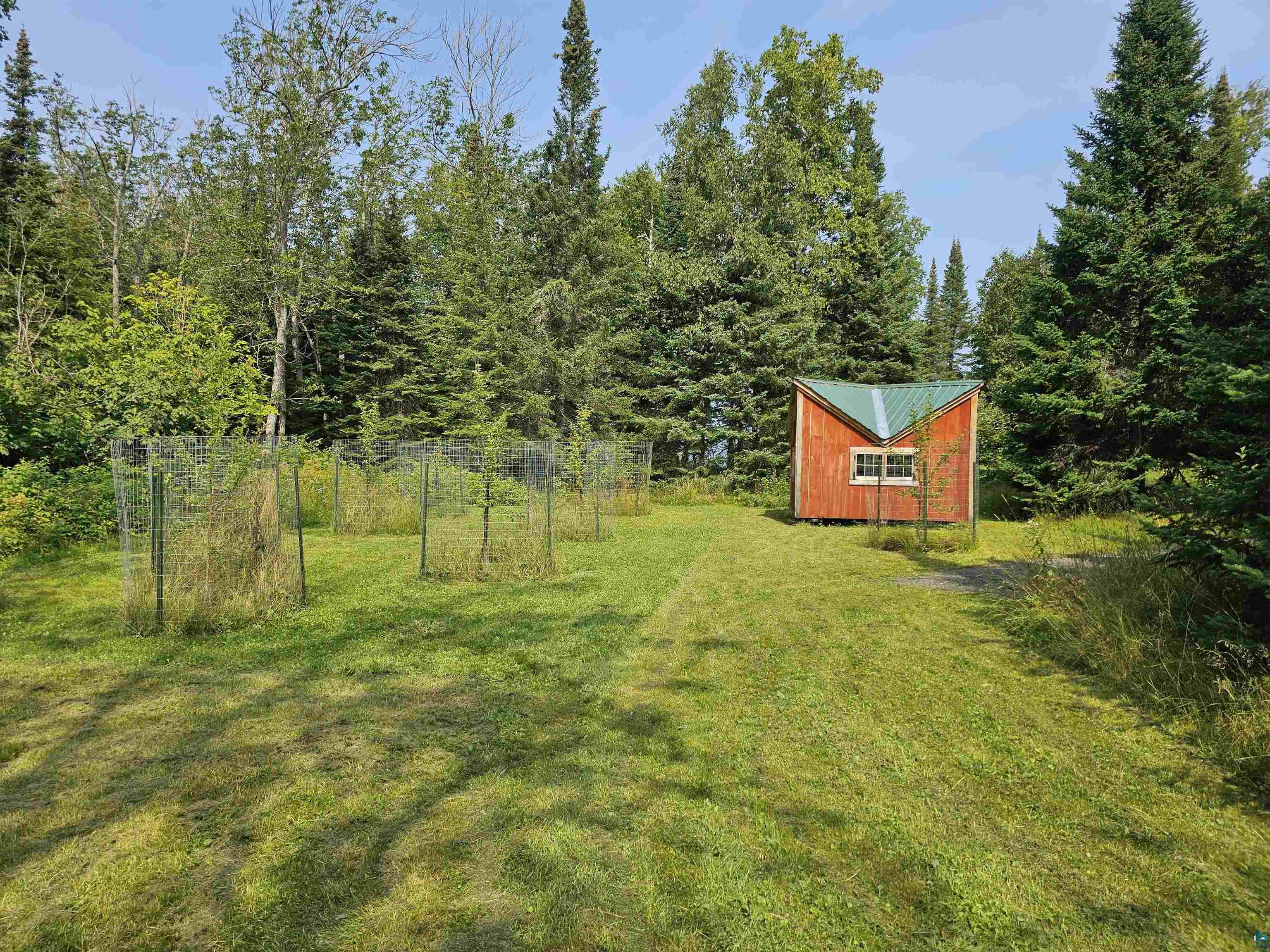 89065 Bark Point Road Herbster, WI 54844 - Photo 7 of 19 View of yard featuring an outbuilding