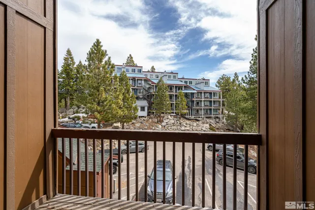 a view of a balcony with city view