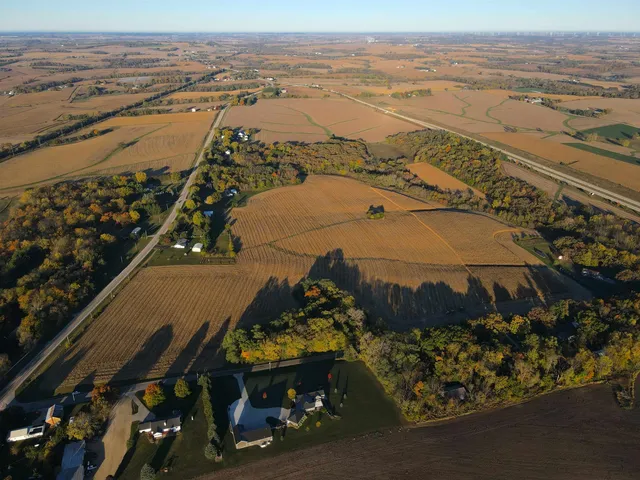 an aerial view of beach and ocean