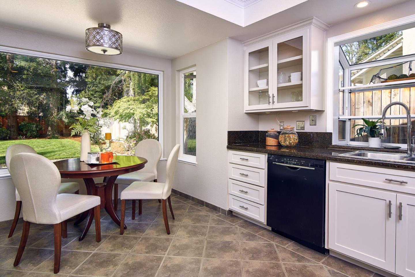 2522 Corte Bella Pleasanton, CA 94566 - Photo 12 of 29 a kitchen with a window dining table and chairs