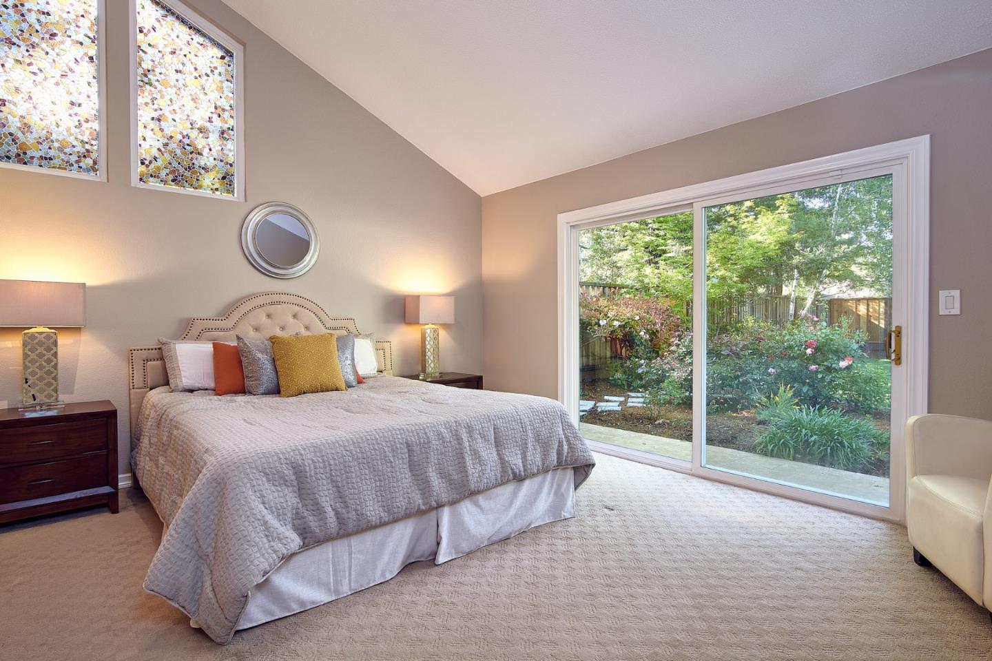 2522 Corte Bella Pleasanton, CA 94566 - Photo 15 of 29 a bedroom with a large bed and a large window