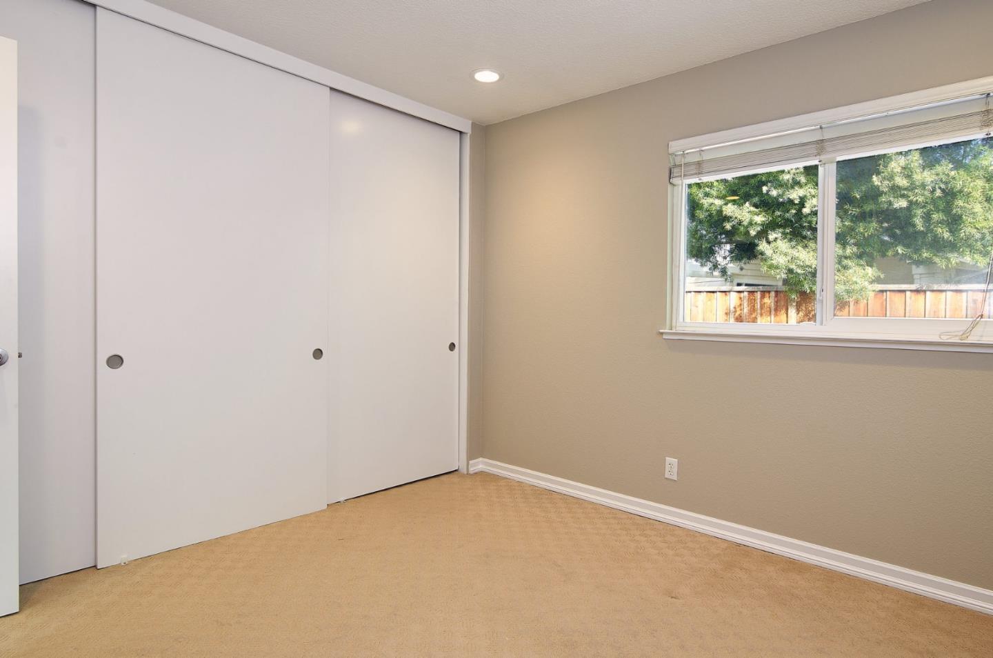2522 Corte Bella Pleasanton, CA 94566 - Photo 21 of 29 a view of an empty room with a window