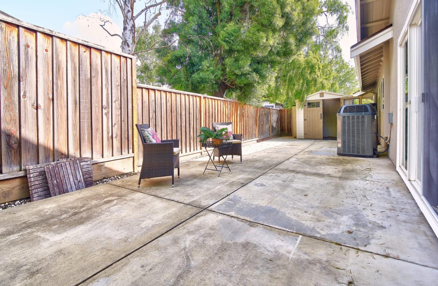 2522 Corte Bella Pleasanton, CA 94566 - Photo 26 of 29 a view of backyard with outdoor seating and trees