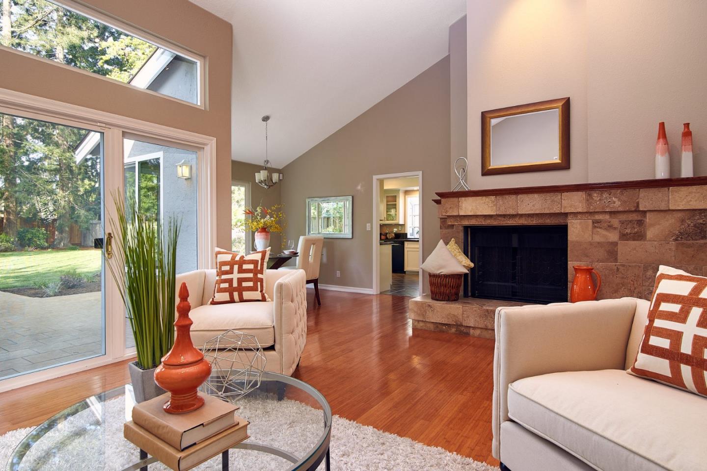 2522 Corte Bella Pleasanton, CA 94566 - Photo 4 of 29 a living room with furniture a fireplace and a large window