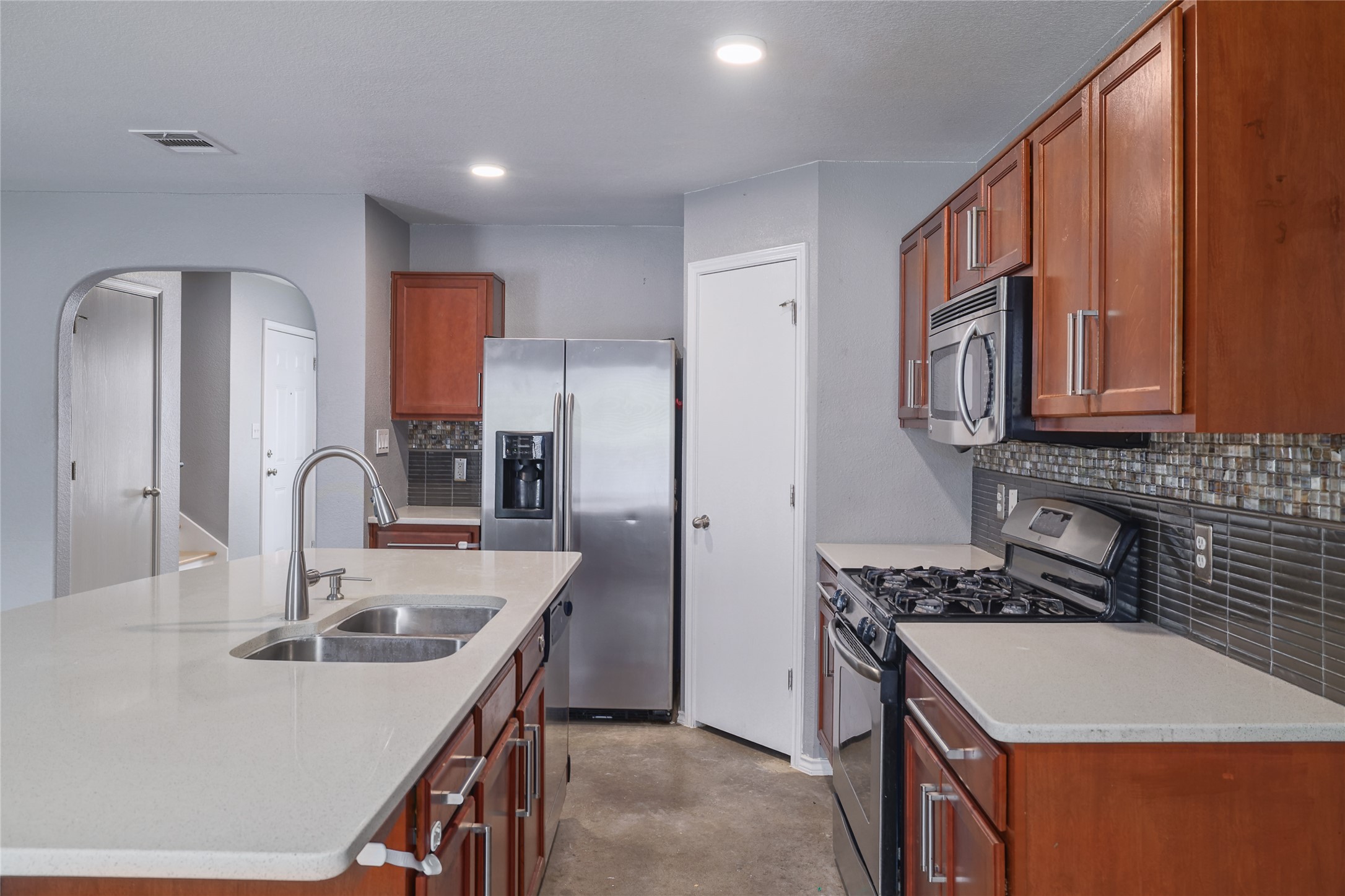 4625 Credo Lane Austin, TX 78725 - Photo 7 of 34 Kitchen view from the dining area