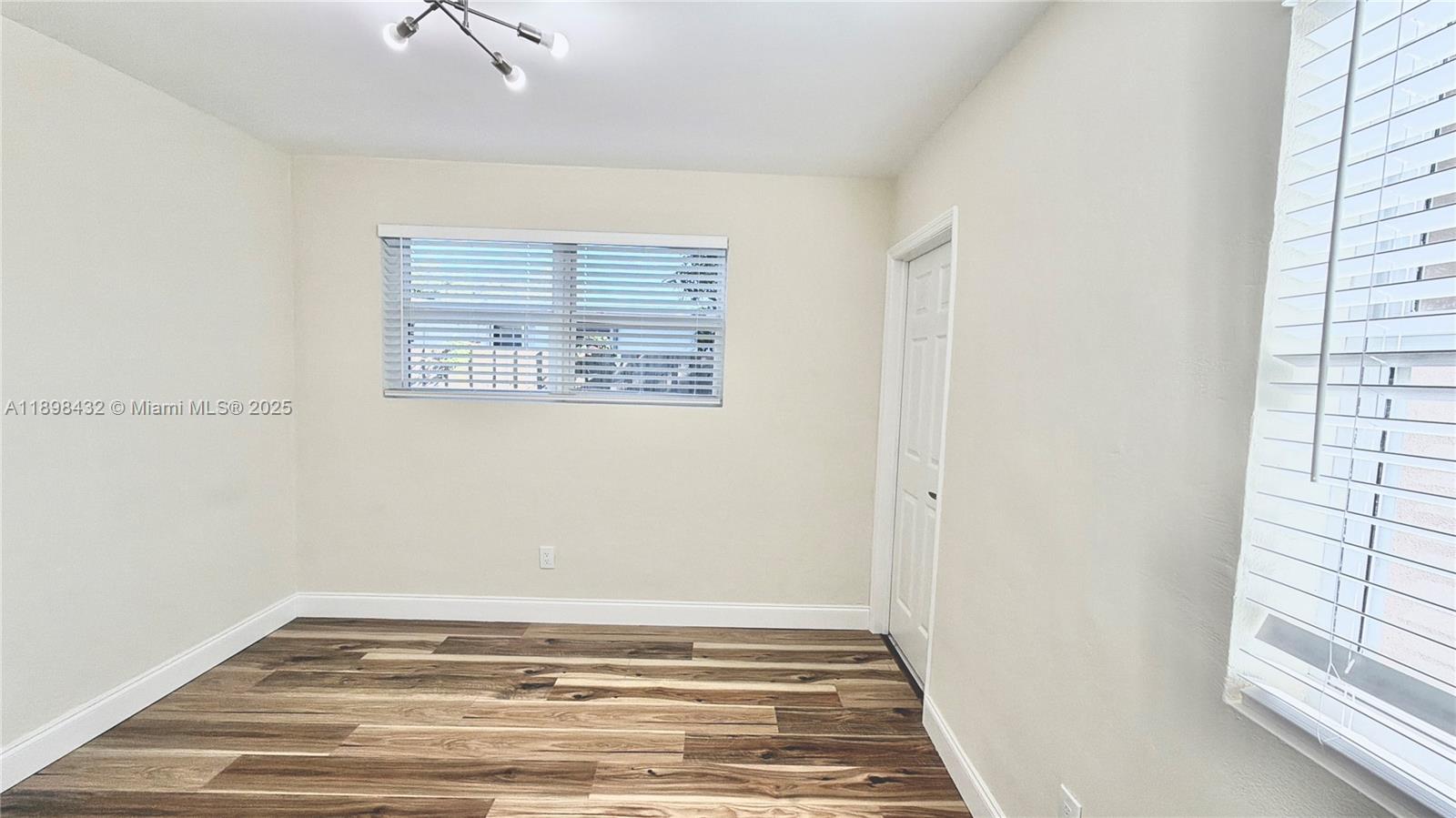 124 Harvard Road West Park, FL 33023 - Photo 31 of 75 a view of an empty room with a window