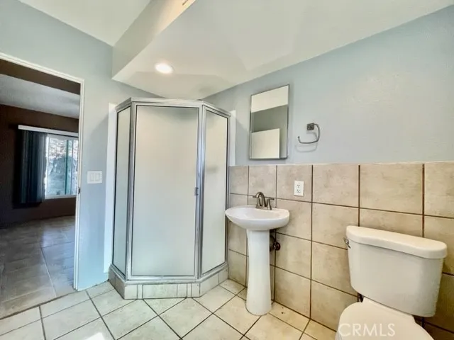 a bathroom with a toilet and a sink