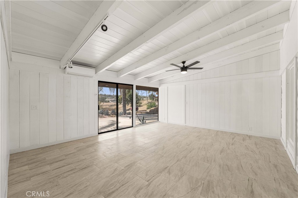 6308 Hawarden Drive Riverside, CA 92506 - Photo 16 of 37 a view of an empty room with a window