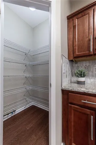a view of a chairs and tables in the back yard of the house