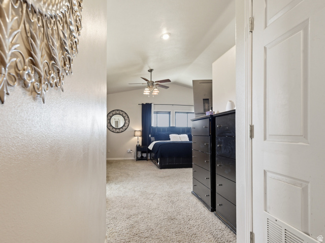 830 North Stone Road Snowville, UT 84336 - Photo 23 of 69 Bedroom featuring light carpet and a textured wall